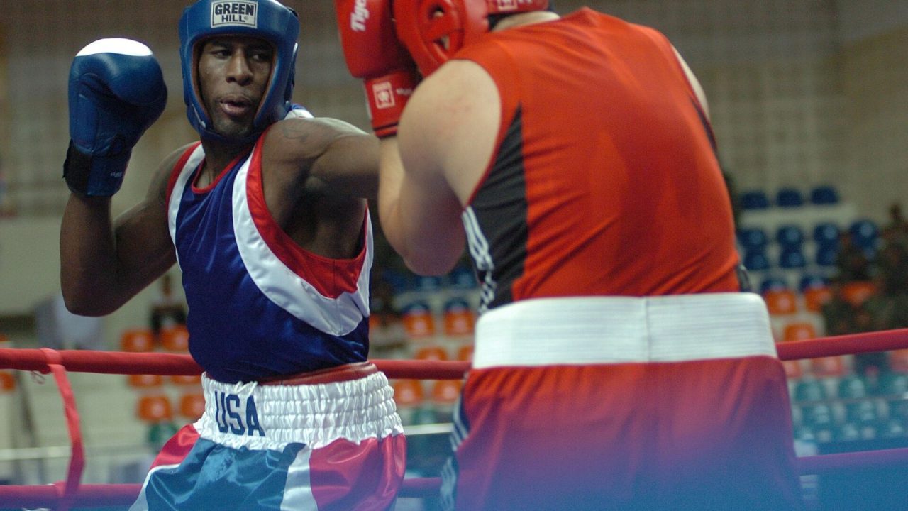 Heavyweight boxer Andrew Shepherd landing a left jab on Erken Teper at the 2007 Military World Games