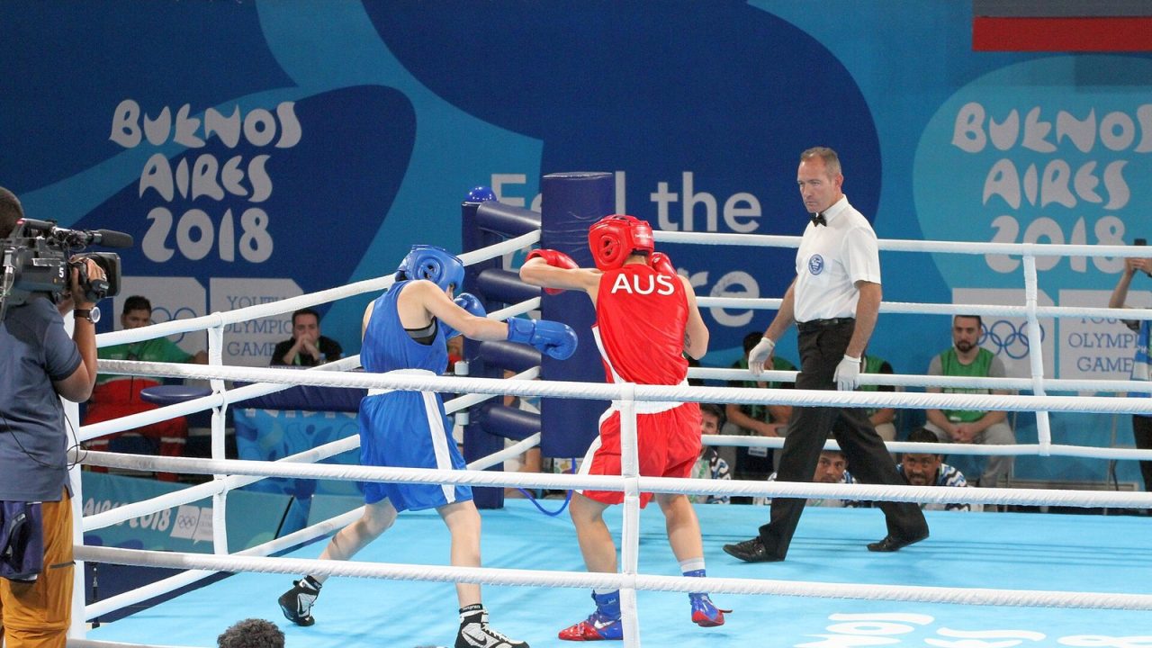 Referee José Romero overseeing a lightweight bout at the 2018 Youth Olympics in Buenos Aires