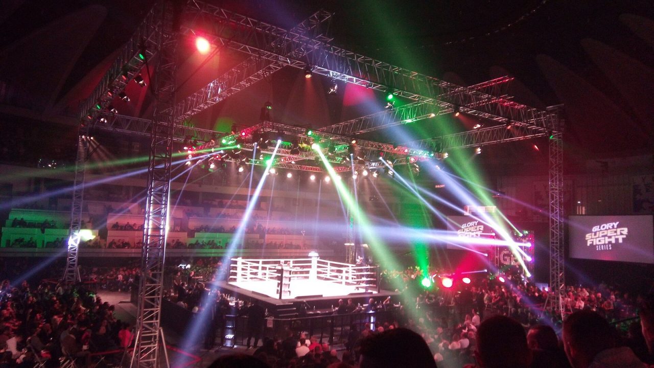 Two kickboxers fighting in the ring at a GLORY kickboxing event in 2017