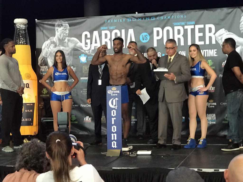 Boxer Chordale Booker standing on the scale at a weigh-in in September 2018